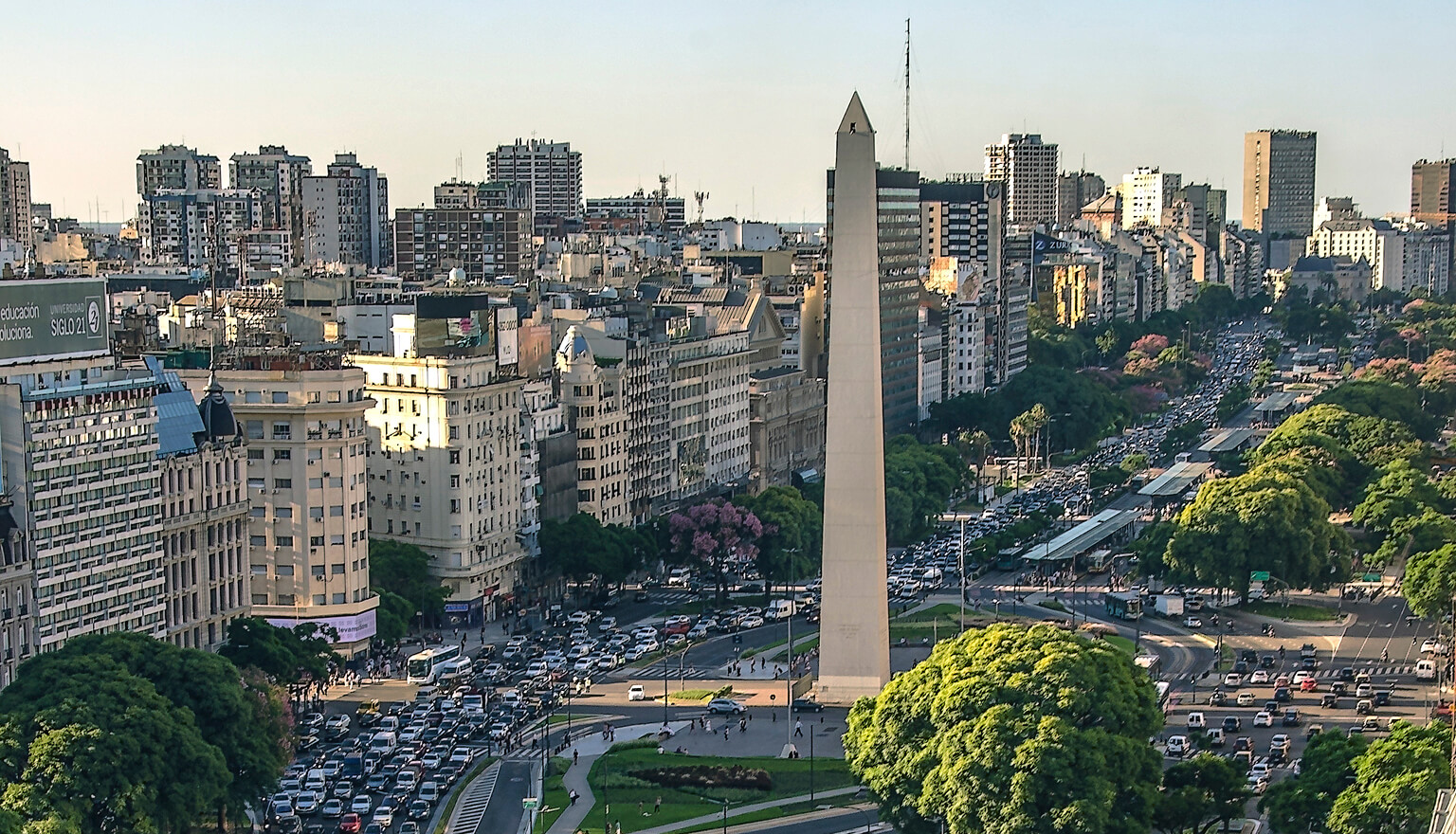 Wide view of a street with cards in Argentina.